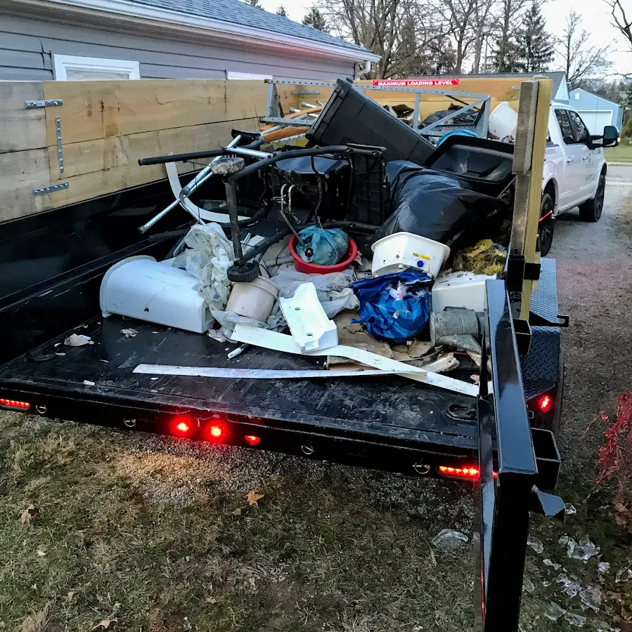 Roll-off dumpster delivered to a residential driveway in Independence