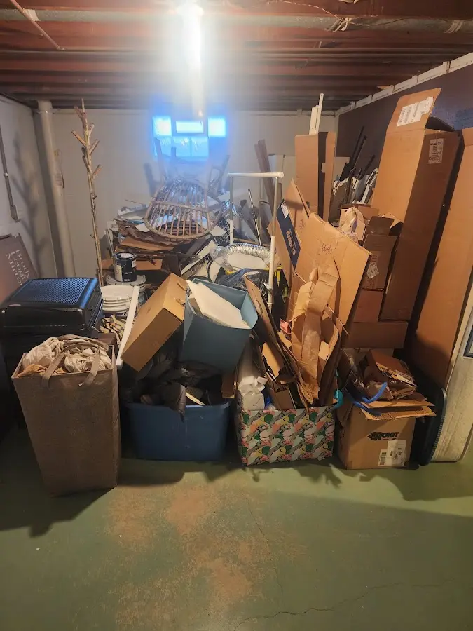 Roll-off dumpster container at job site for 4 Yard Dumpster Rental in Independence